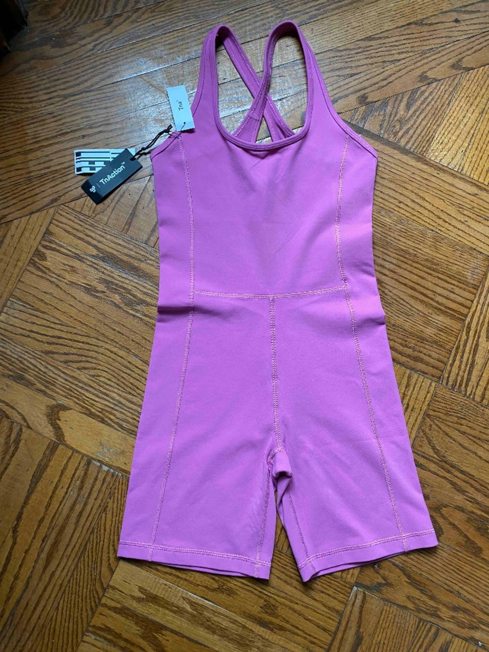 Aritzia TNA Life Surge Romper — Berry Fizz (magenta/purple)